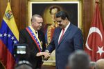 Recep Tayyip Erdogan meets with Nicolas Maduro at the presidential palace in Caracas on Dec. 3, 2018.