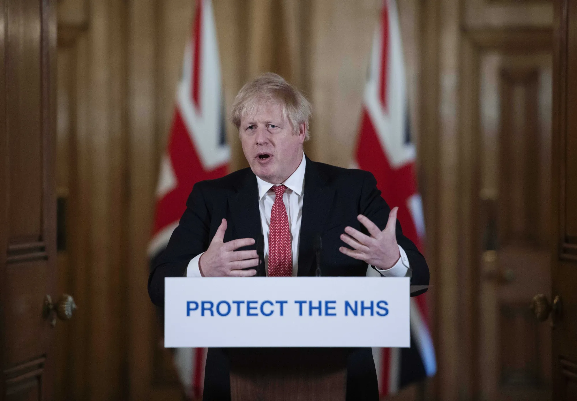 Boris Johnson speaks during a daily coronavirus briefing inside number 10 Downing Street in London on March 20.