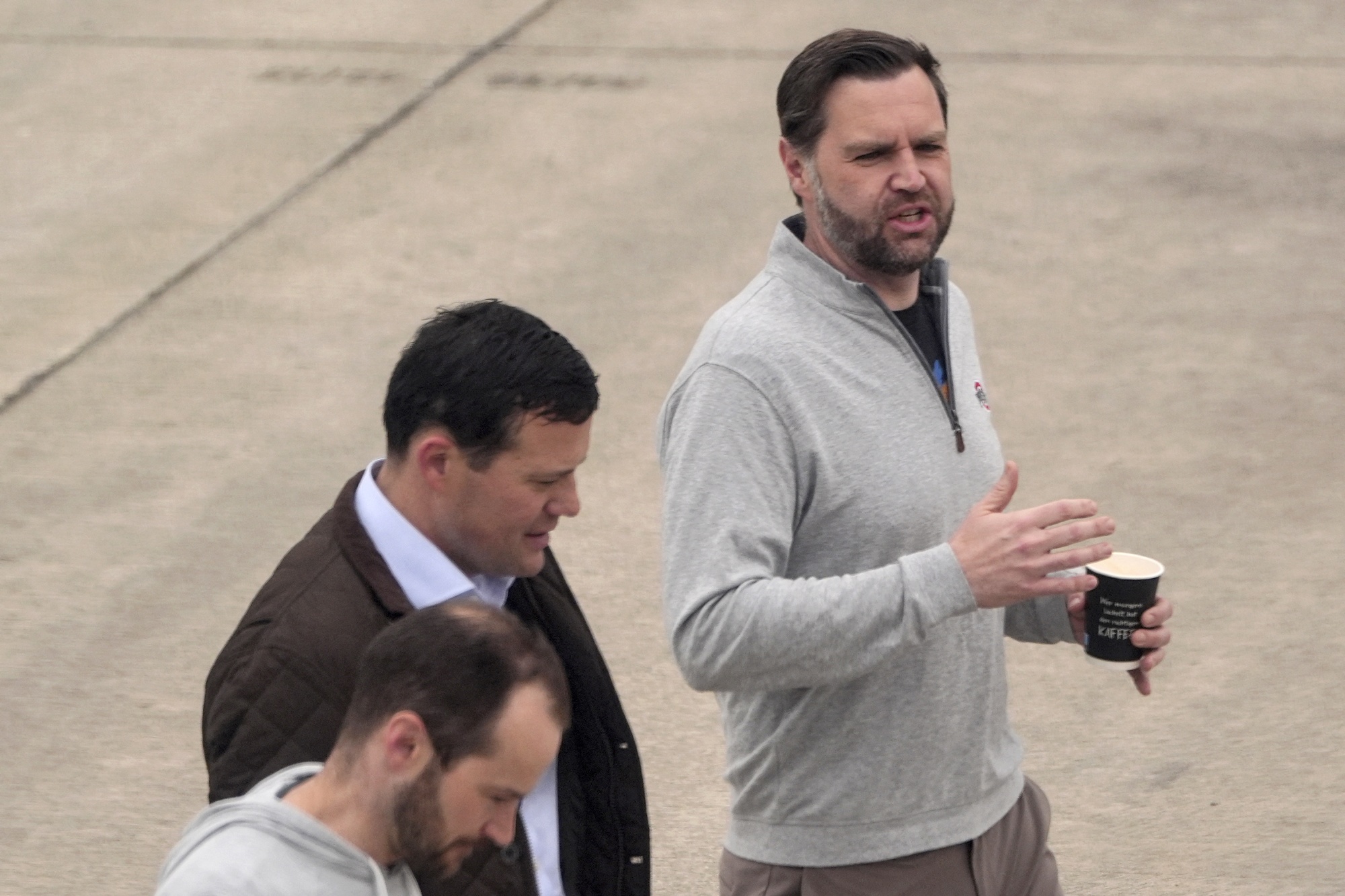 US Vice President JD Vance (R) walks across the tarmac during a scheduled refuelling stop at Ramstein Air Base in Germany on April 12, 2026 following his departure from Islamabad after talks on Iran. Iran and the United States failed to strike a deal on April 12 to end the war in the Middle East, but there was no immediate return to hostilities and the region clung to hope that a fragile truce would hold. (Photo by Jacquelyn Martin / POOL / AFP via Getty Images) Photographer: JACQUELYN MARTIN/AFP
