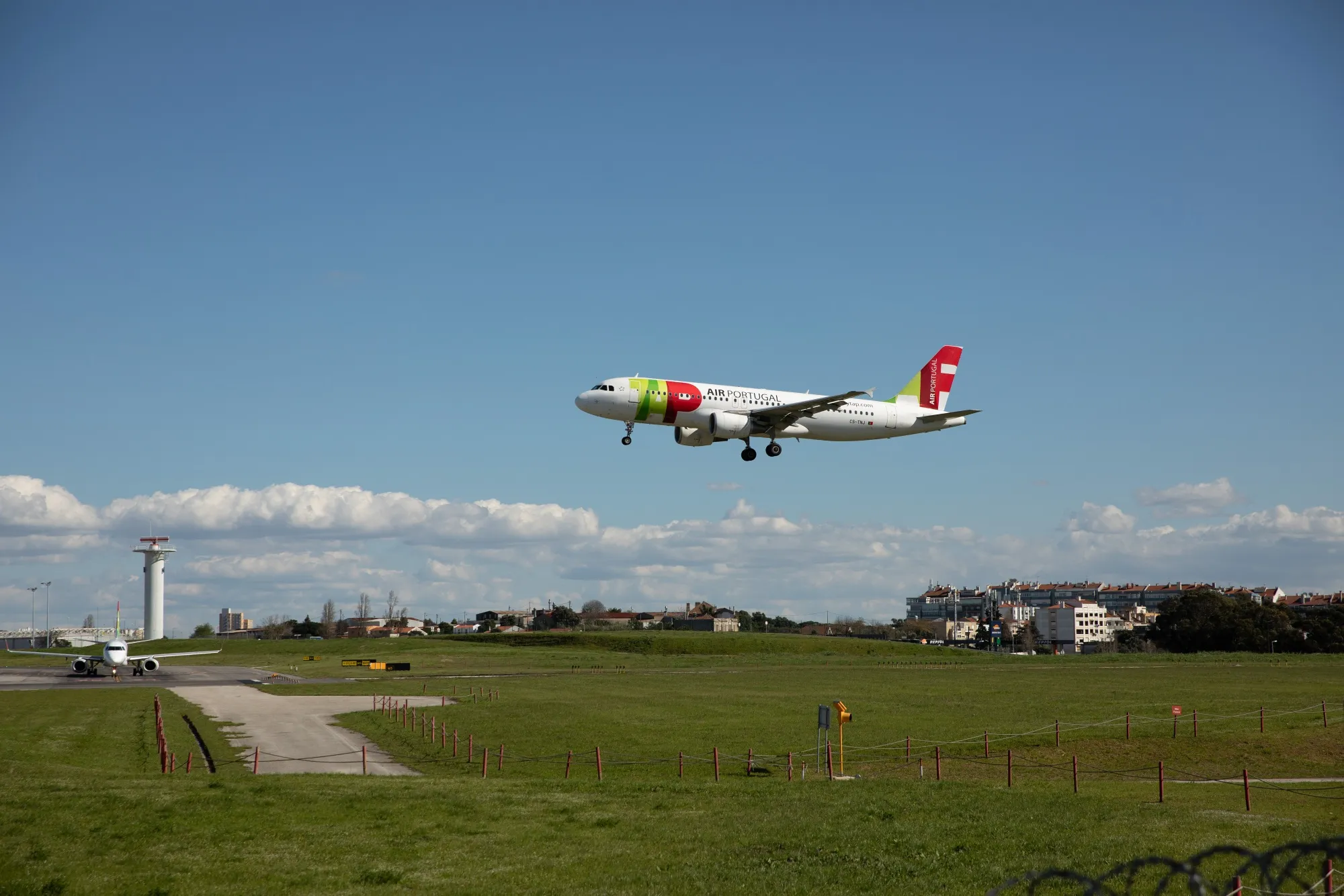 A TAP passenger jet at Humberto Delgado Airport in Lisbon.