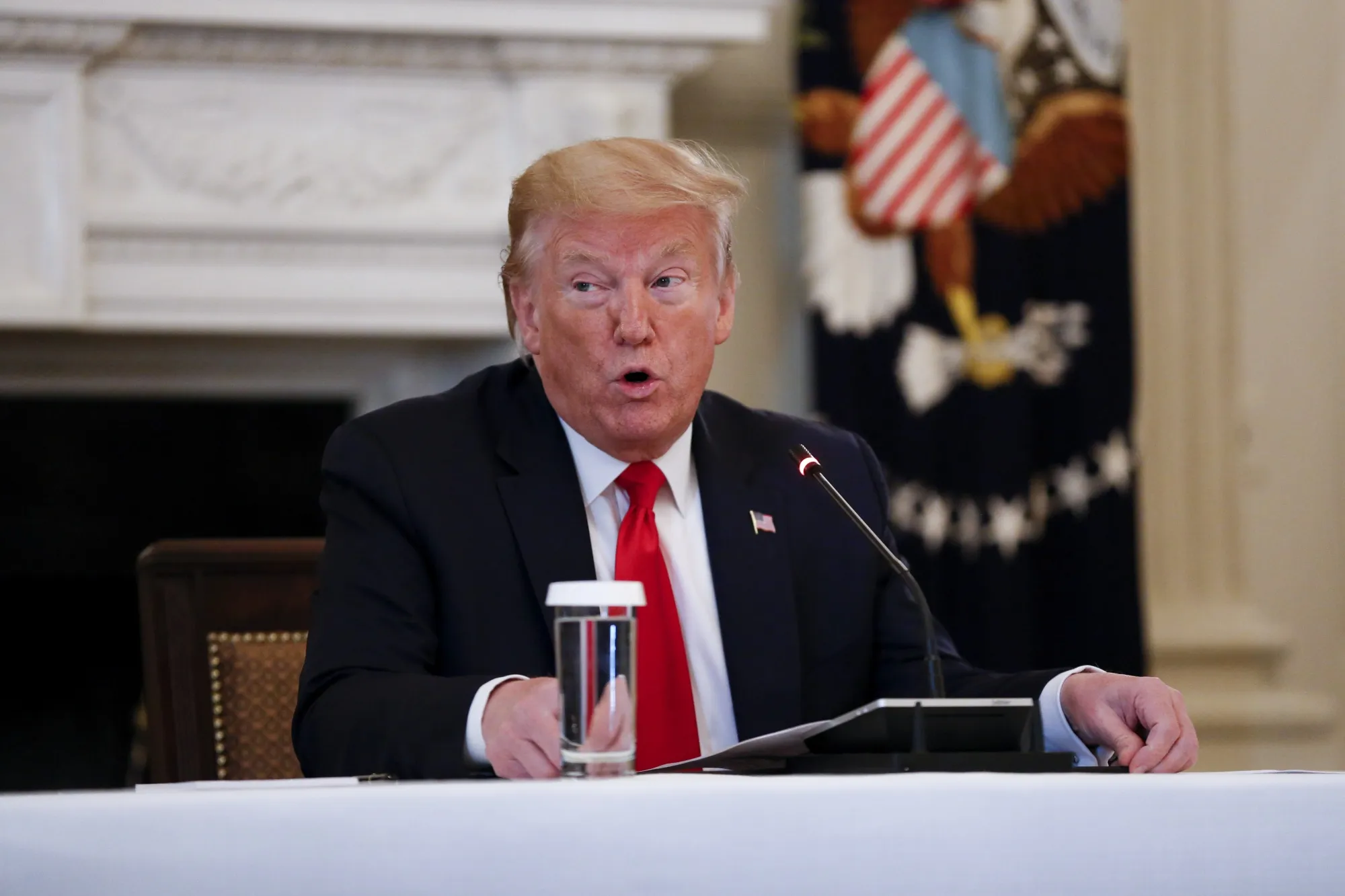 U.S. President Donald Trump speaks during a meeting at the White House on April 29.