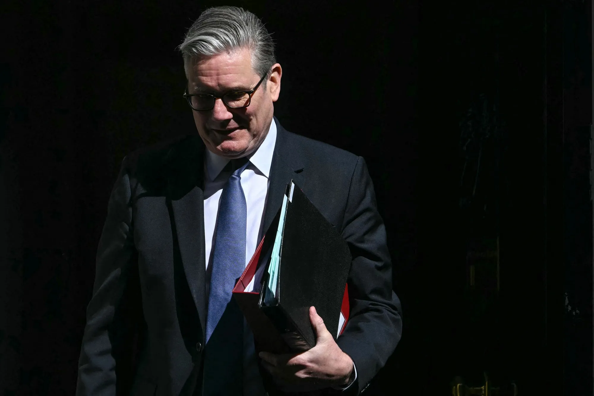 Prime Minister Keir Starmer leaves 10 Downing Street in London on April 22.