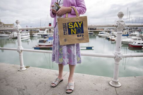 A supporter hands out U.K. Independence Party (UKIP) leaflets in Ramsgate, east of London, on Sept. 7.
