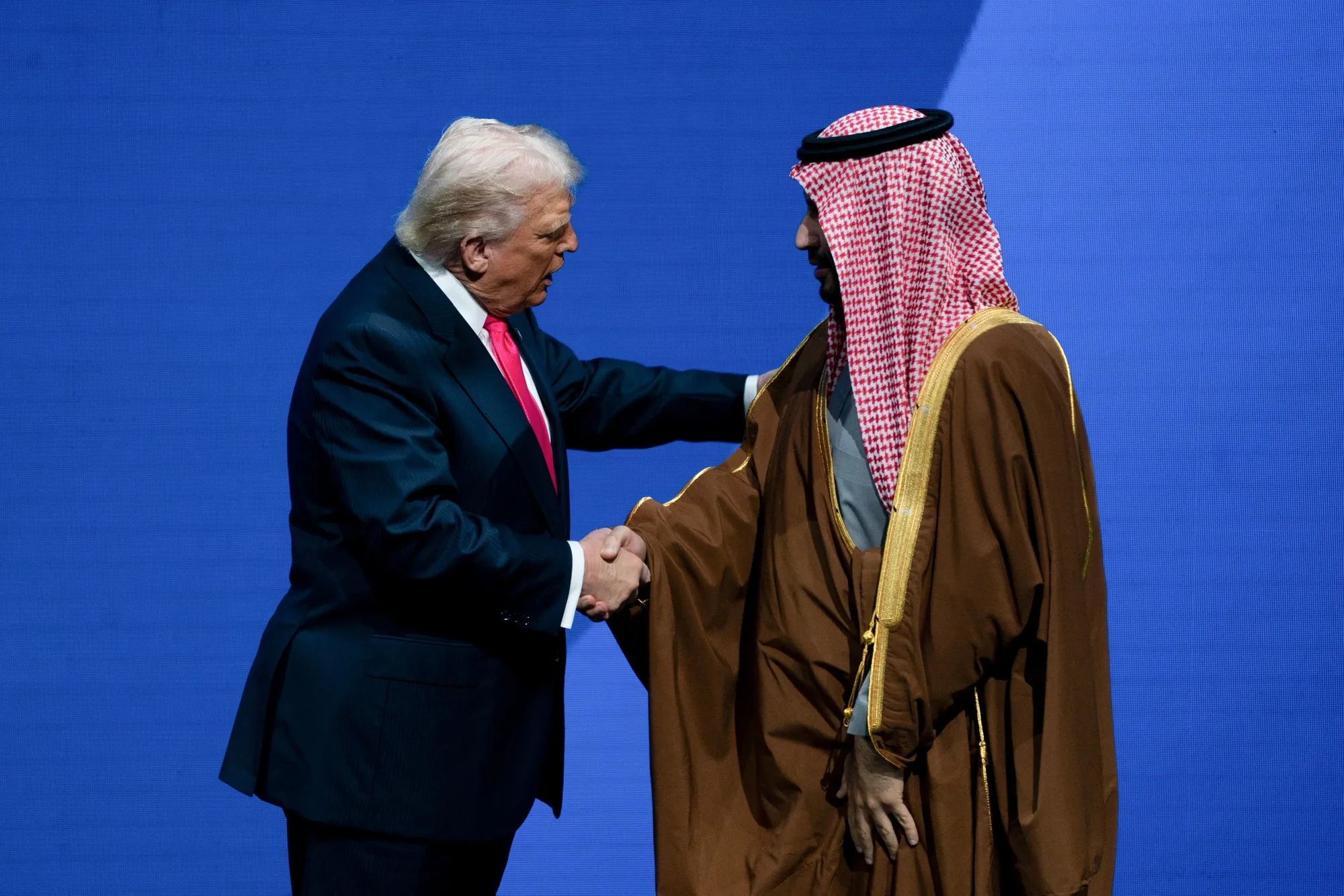 President Donald Trump and Saudi Crown Prince Mohammed bin Salman shake hands during the US-Saudi Investment Forum in Washington.