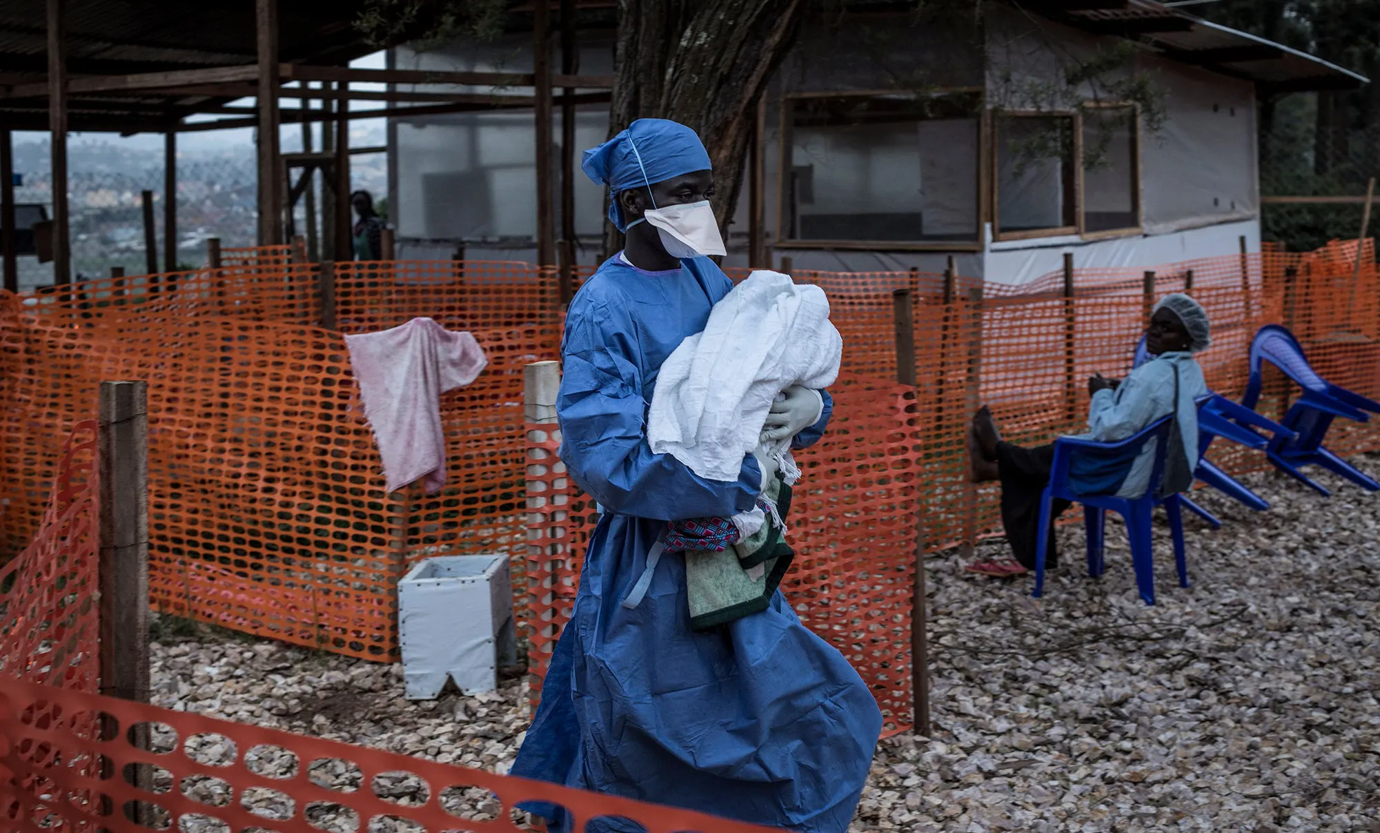 A health worker carries a four-day-old baby suspected of having Ebola, into a MSF (Doctors Without Borders) supported Ebola Treatment Center in Butembo, Democratic Republic of the Congo on Nov. 4, 2018.&nbsp;