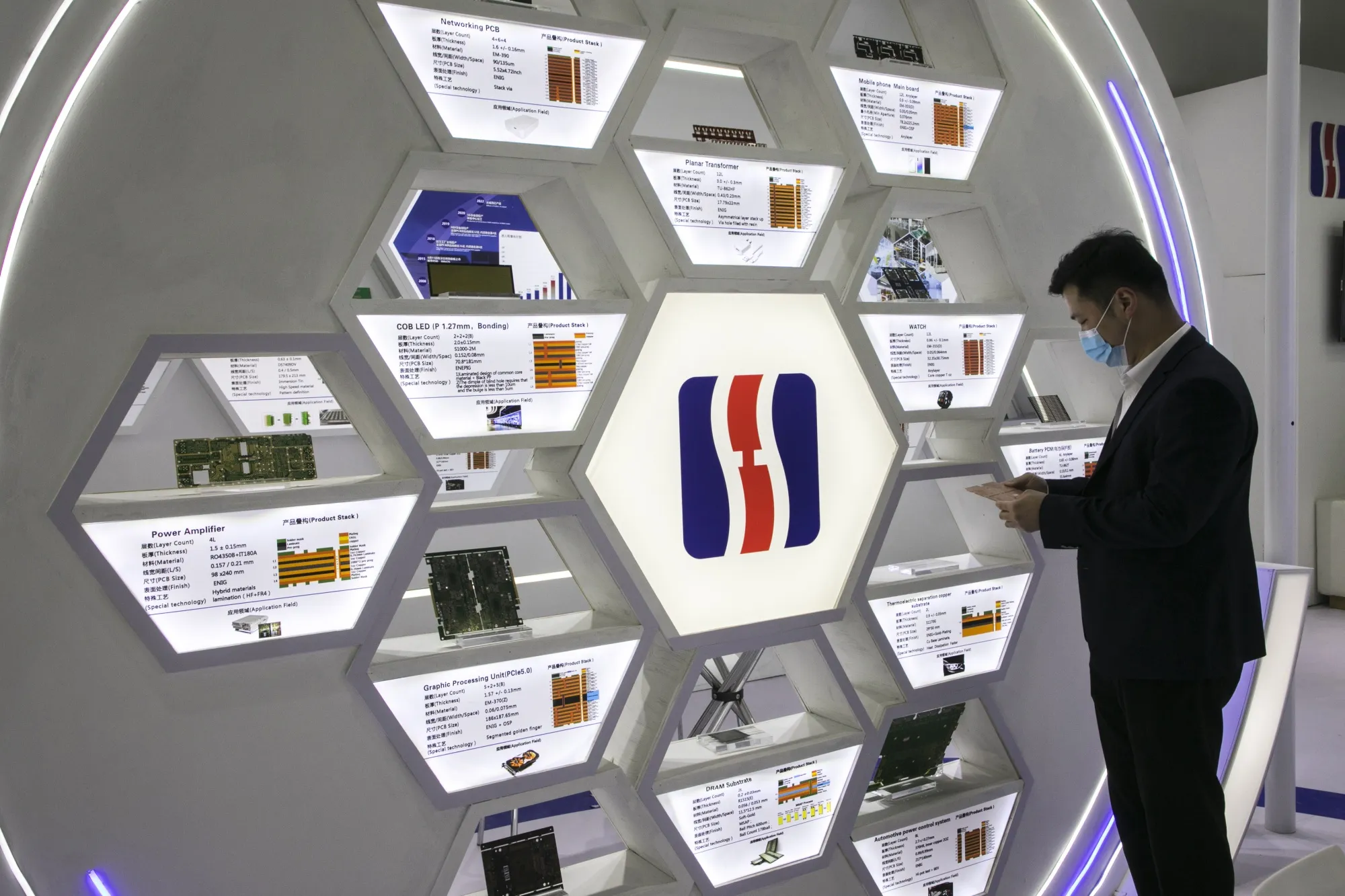 Circuit boards displayed at the Victory Giant booth at an expo in Shanghai.