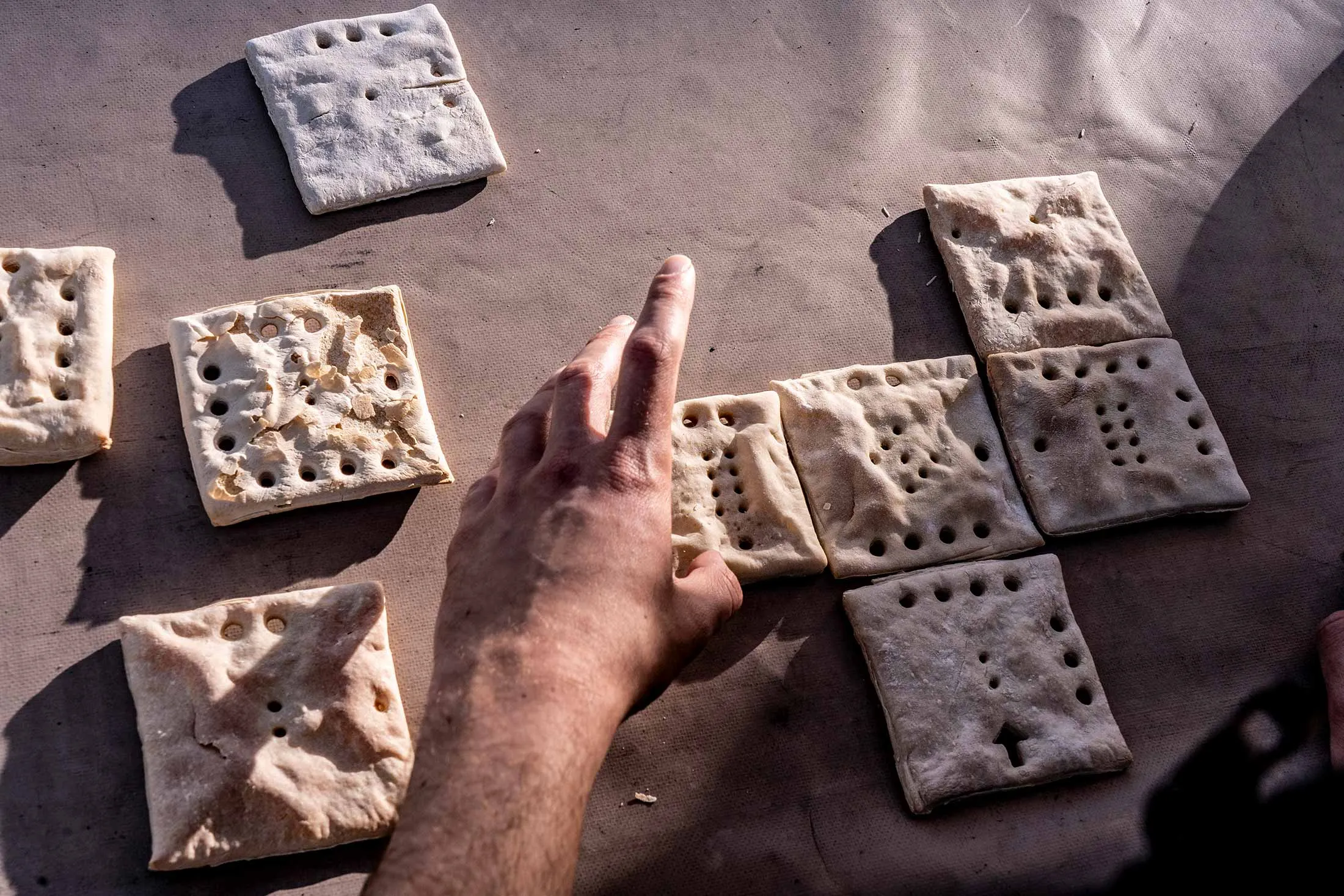 A maritime-themed puzzle with baked hardtack-style crackers at Pier 16 in Manhattan.