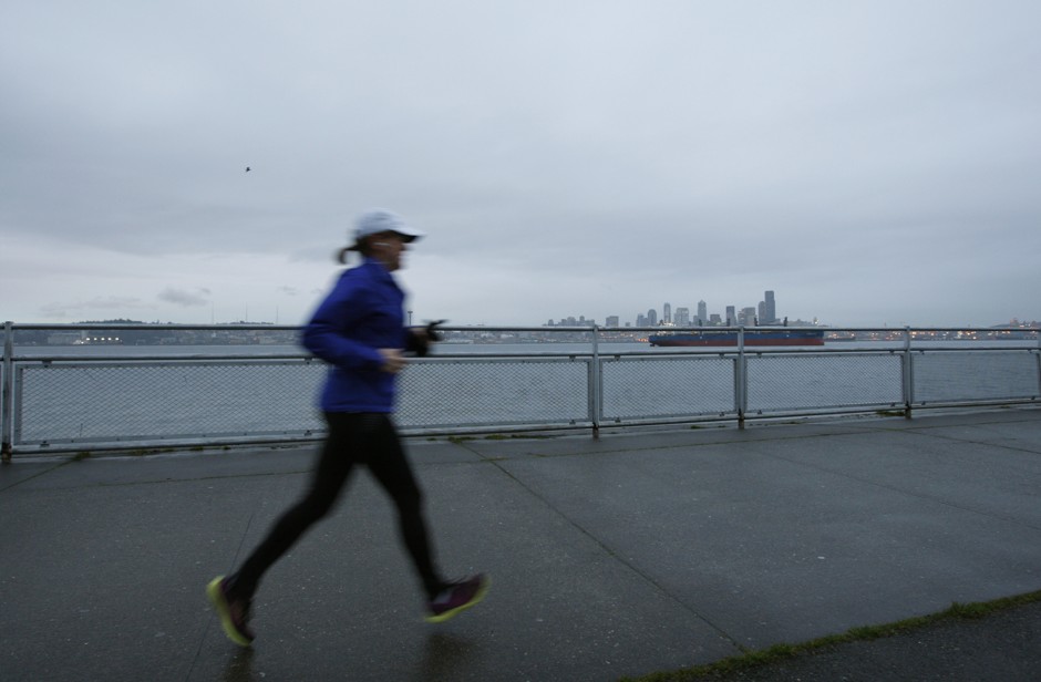 A lone runner in a Seattle waterfront neighborhood. 