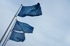 European Union (EU) flags fly from flagpoles outside the Berlaymont building in Brussels, Belgium, on Wednesday, Oct. 9, 2019. The Brexit talks have turned into an angry stalemate, as U.K. and EU leaders focused on blaming each other for refusing to budge.