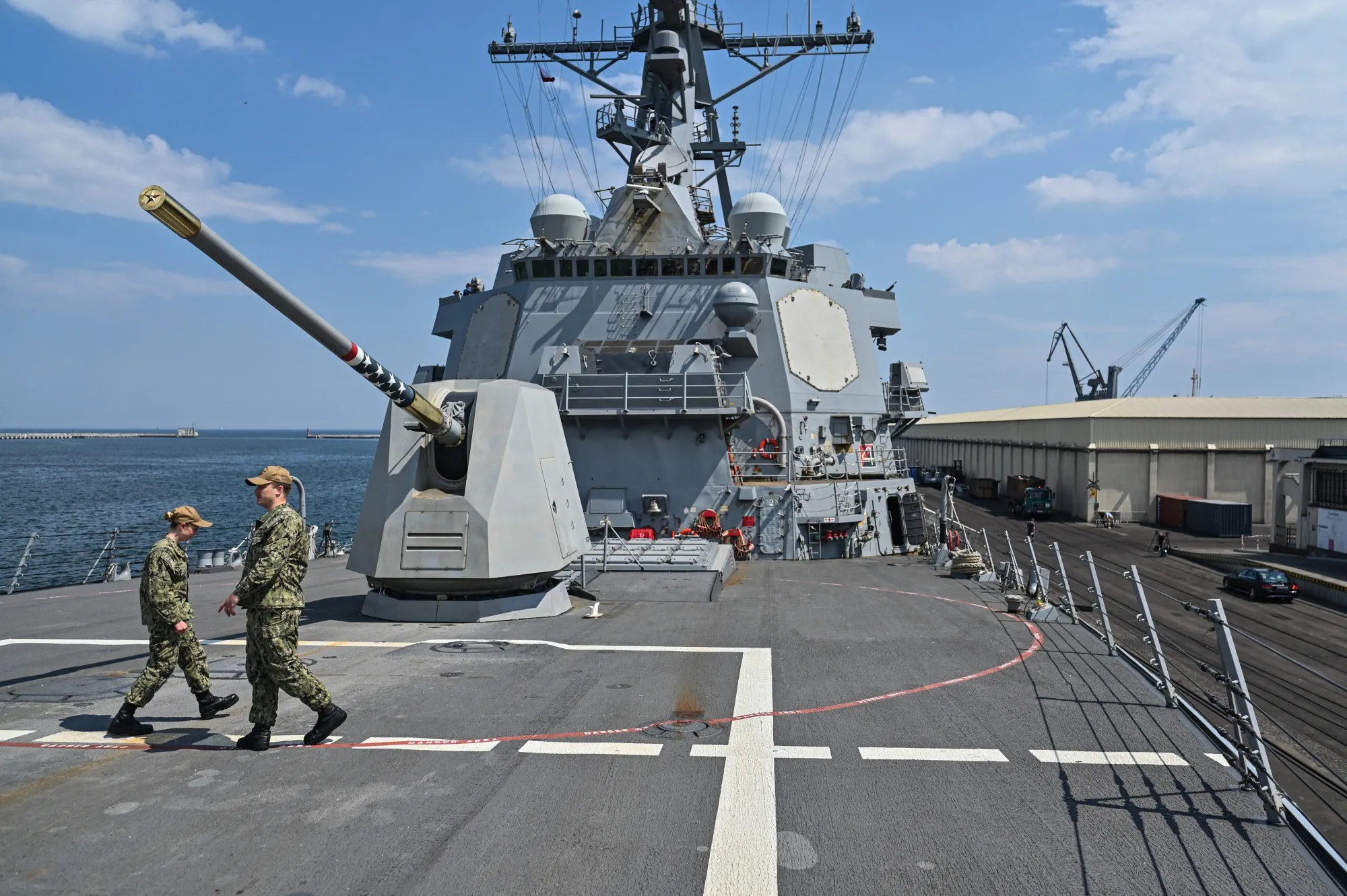 US navy soldiers on the deck of the USS Gravely.