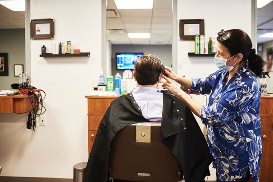 Goldman’s Local Barber Trims Shaggy Bankers Once Again