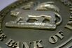 The seal for the Reserve Bank of India hangs on a wall in th