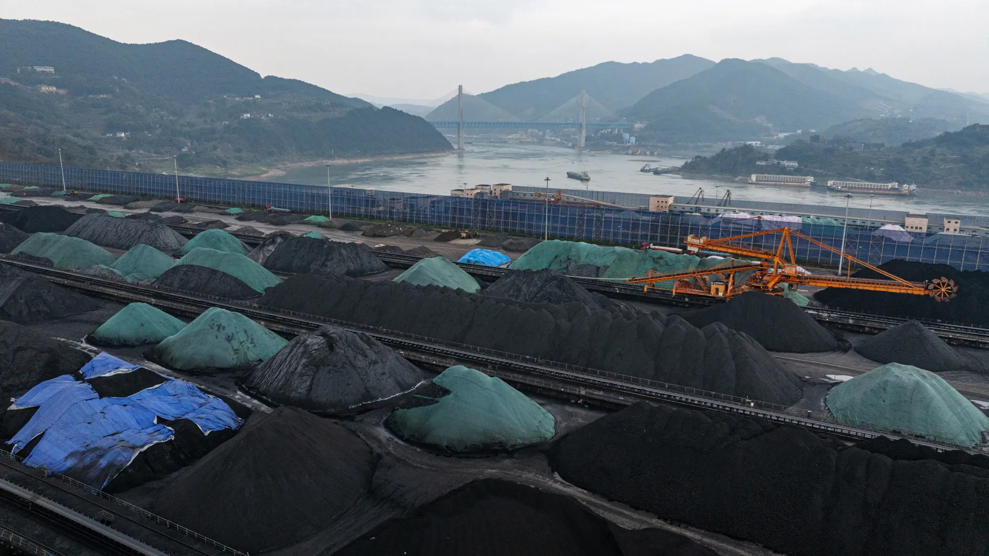 Stockpiles of coal at the Guoyuan Port Container Terminal in Chongqing, China, in February.