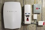 A Tesla Motors Inc. Powerwall unit sits inside a home in Monkton, Vermont.