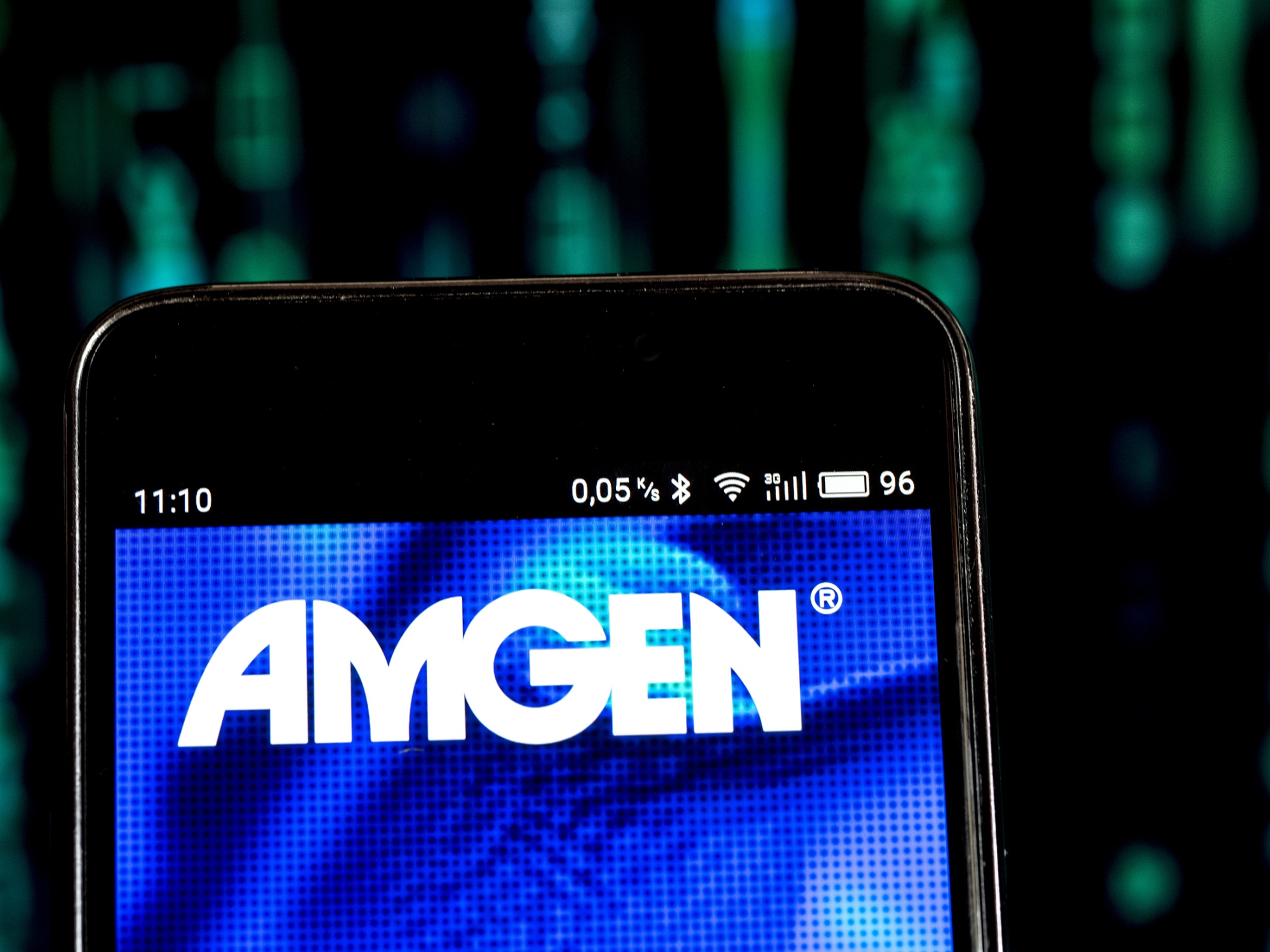 The Amgen logo on a smartphone.&nbsp;