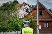 Officials inspect damage to a property after it was struck by drone debris, in Wyryki-Wola, Poland, on Sept. 10.