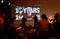 Assange participates via video link at a news conference with WikiLeaks journalist Sarah Harrison (right) in Berlin on October 4.