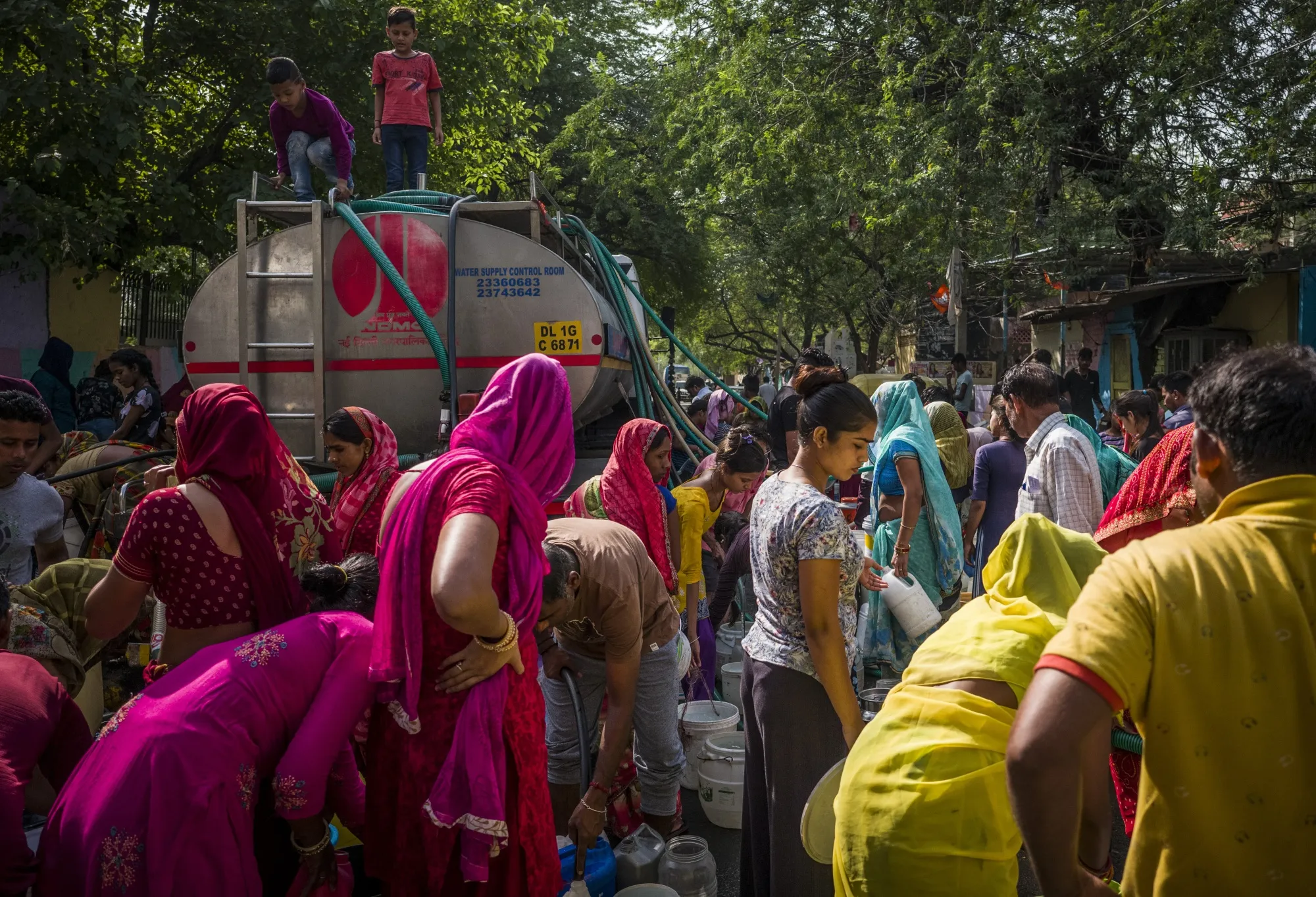 Residents fill water from a Delhi Municipal&nbsp;truck in New Delhi, India, on&nbsp;April 30.