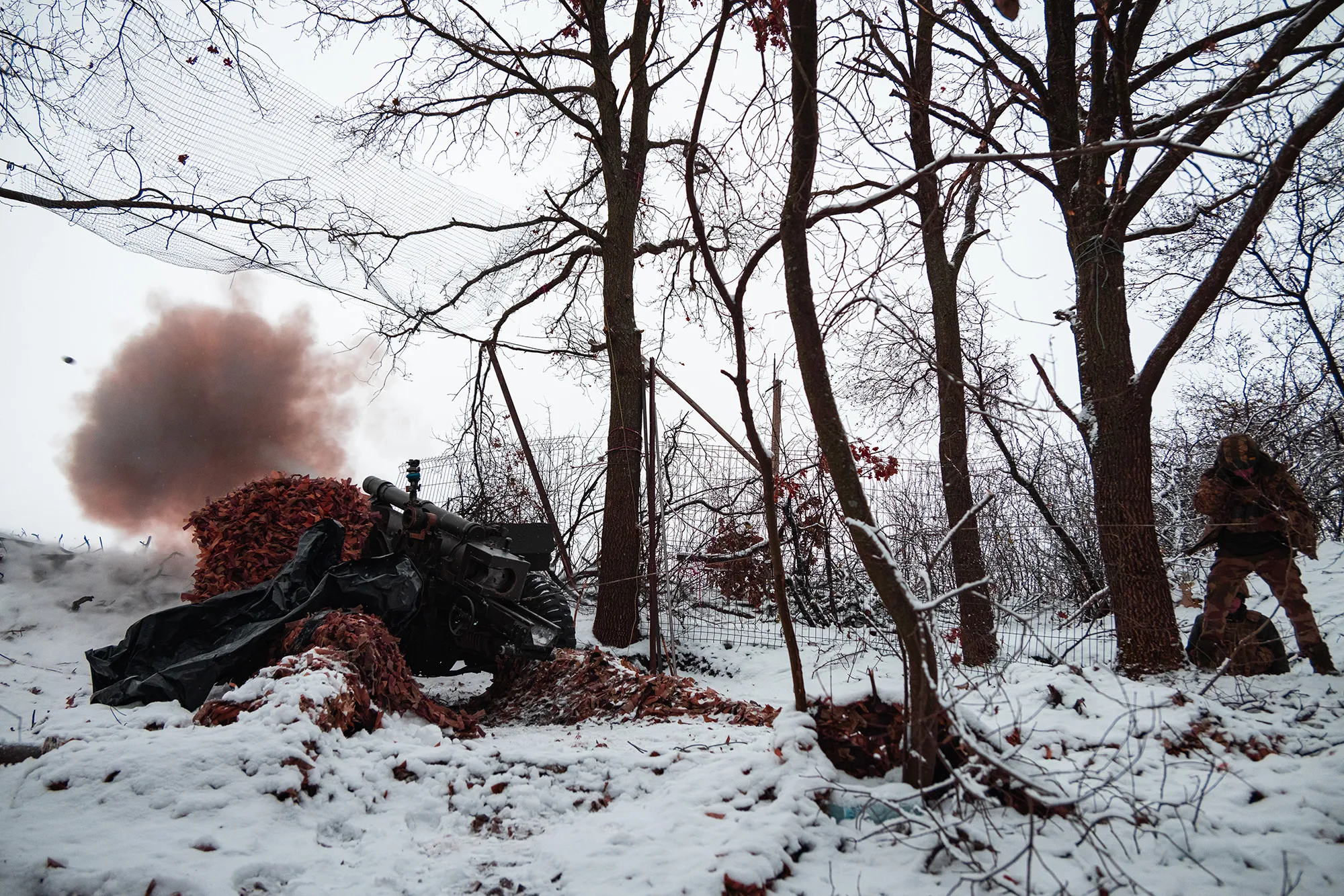 Soldiers during combat work with howitzer M101A1&nbsp;in Kharkiv, Ukraine, on Dec. 6.&nbsp;
