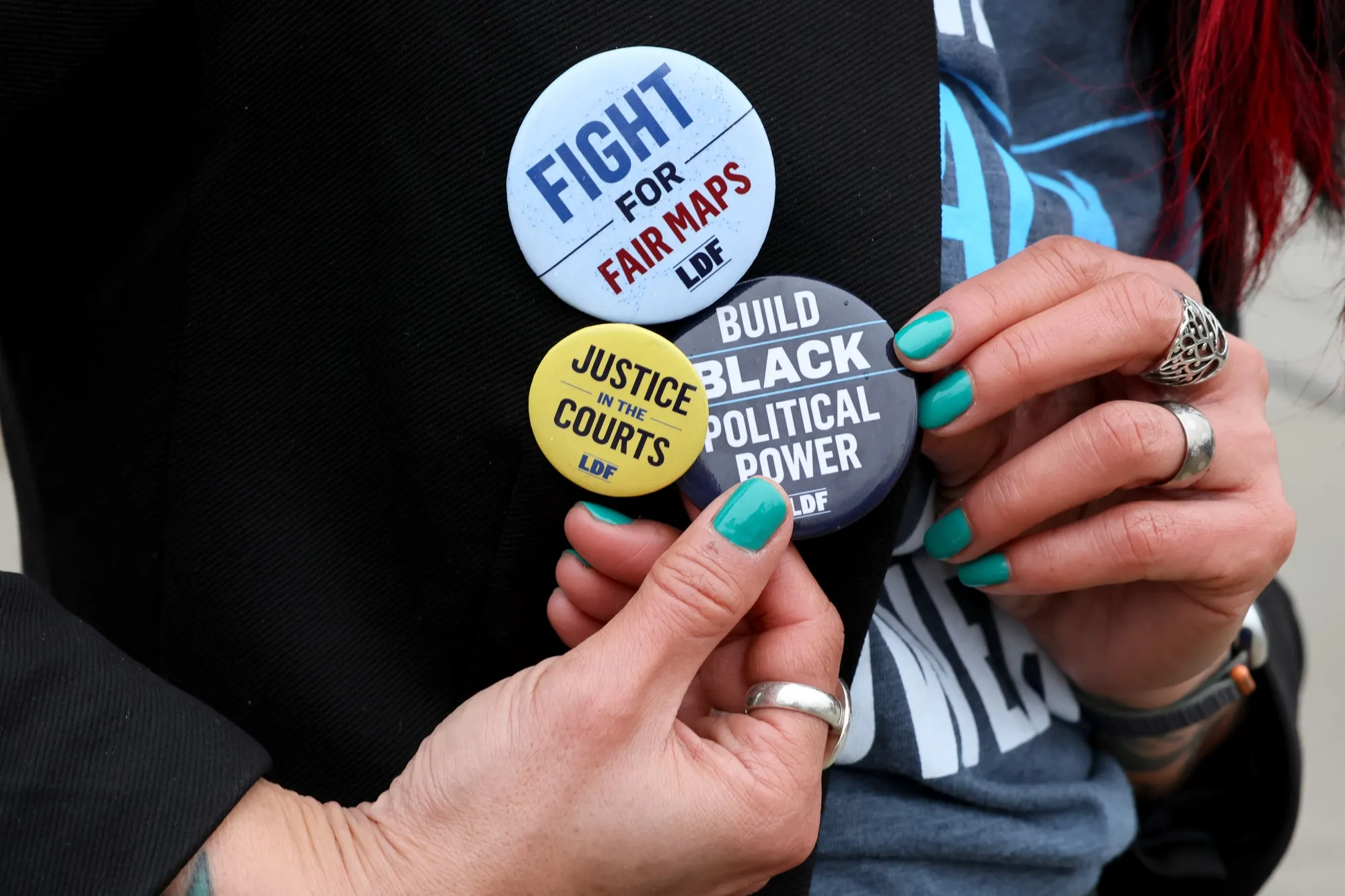 Louisiana voters and civil rights advocates demonstrate outside the US Supreme Court&nbsp;in Washington, DC, on March 24.&nbsp;