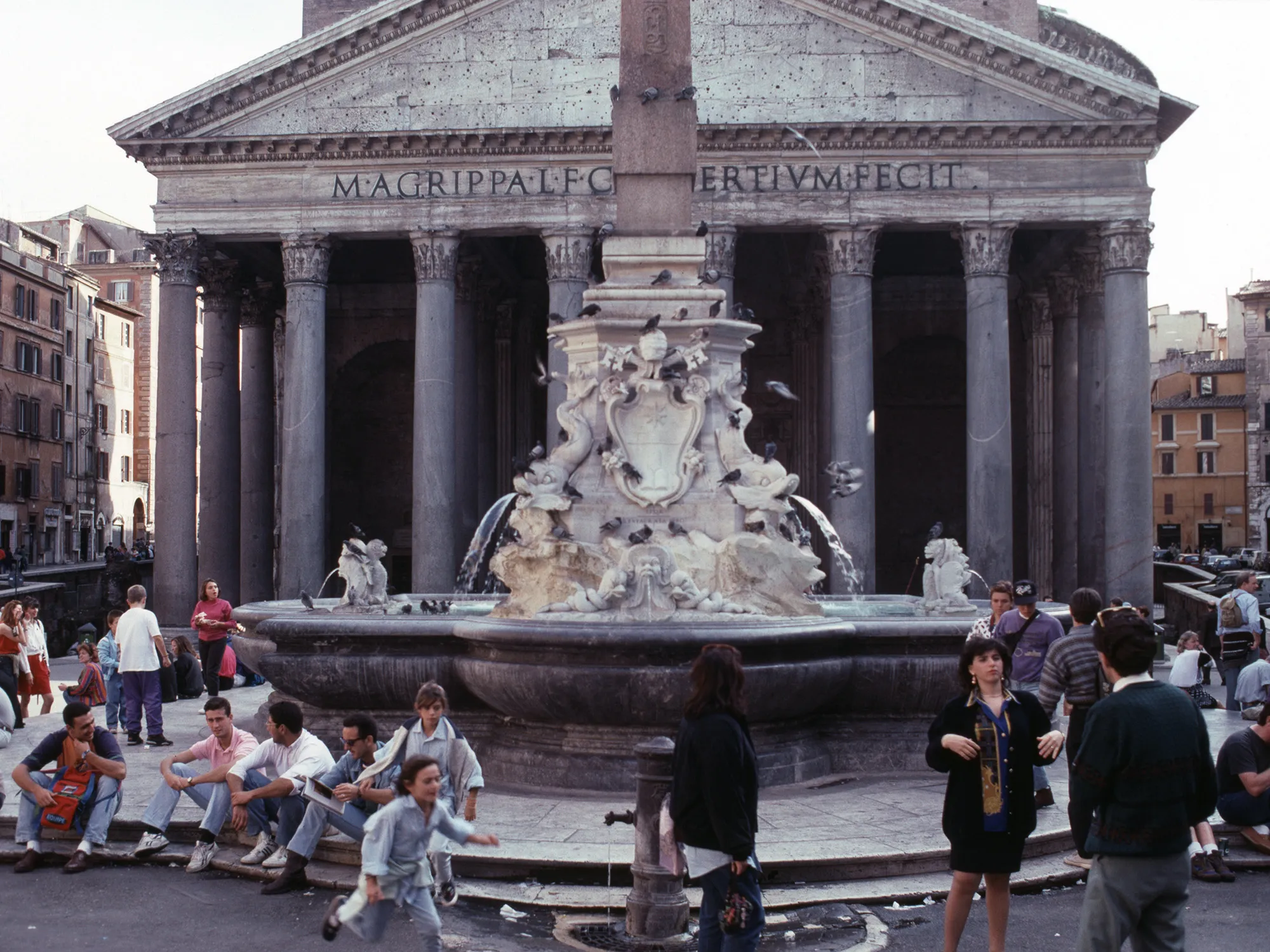 People gather around la Fontana del Pantheon in Rome in 1992.