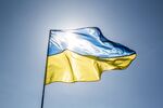 A Ukrainian flag flies