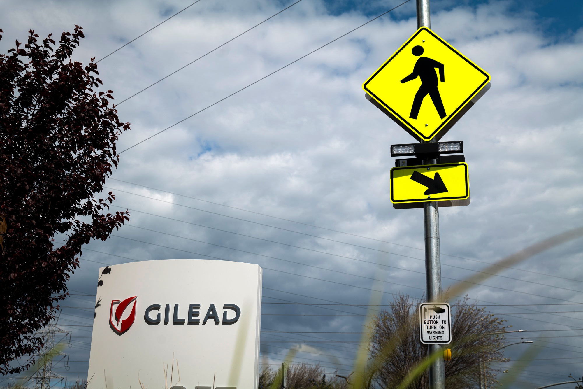 Signage is displayed outside Gilead Sciences Inc. headquarters in Foster City, California.