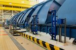 Low pressure turbines in the turbine hall during a media tour of the Flamanville 3 reactor at the Evolutionary Power Reactor (EPR) nuclear power plant, operated by Electricite de France SA (EDF), in Flamanville, France, on Tuesday, June 14, 2022.