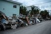 Sand cleanup recovery after Hurricane Helene caused massive flooding in Tampa Bay.