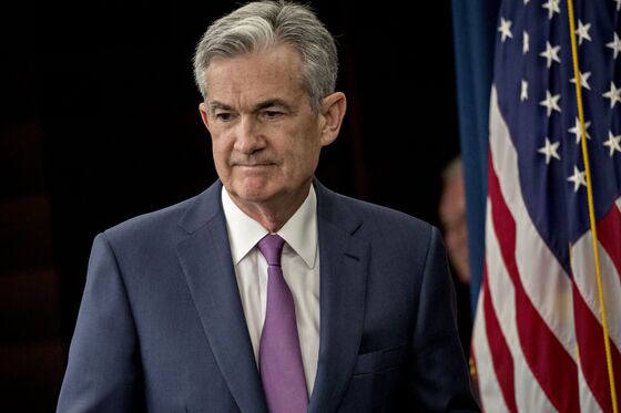 Powell to Cross Political Minefield as Trade War Clouds Outlook