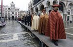 A flooded St. Mark's Square during the Venice carnival in February 2015.