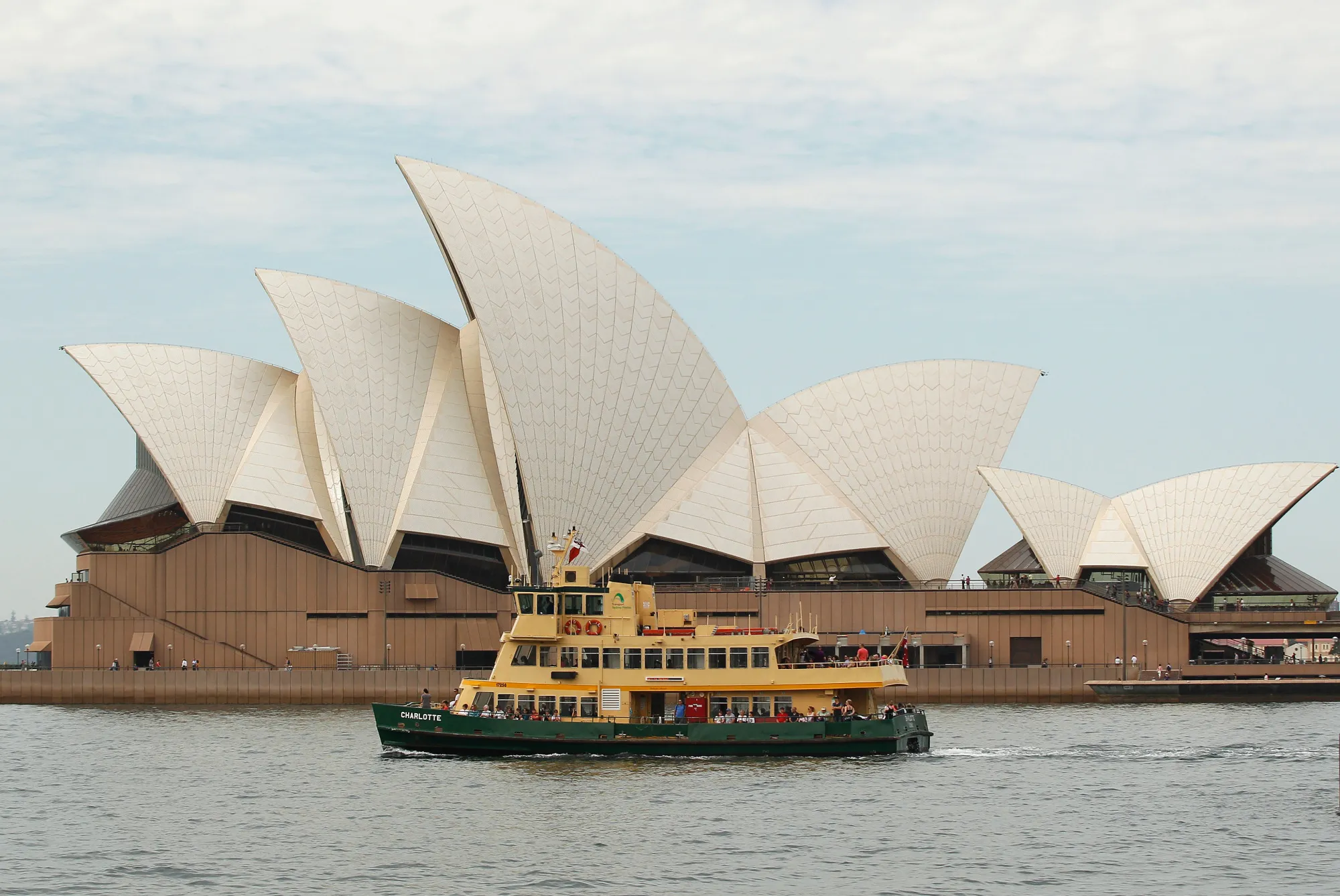 A ferry sails past the Sydney Opera House in Sydney, Australia, on Friday, April 29, 2016. Australia’s drive to balance the books will see the federal government’s debt pile top out within about five or six years and then start to shrink again, according to Treasurer Scott Morrison.