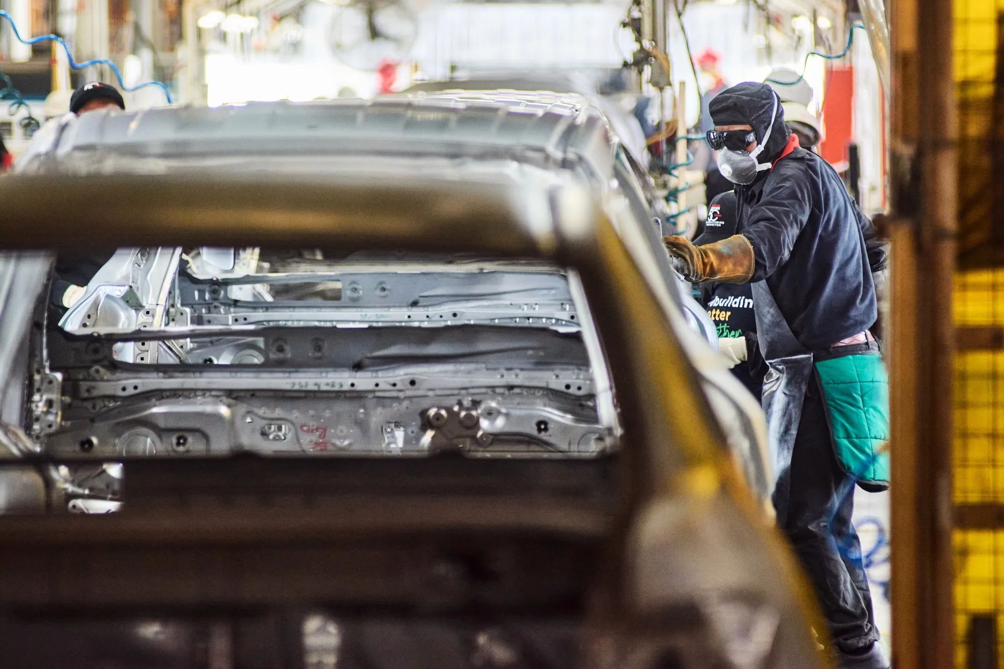 A worker on the automobile assembly line at a manufacturing plant in Durban.