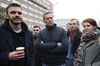 Alexey Navalny, centre, surrounded by members of his team, at a rally to support political prisoners in Moscow, Russia, Sept. 29, 2019.
