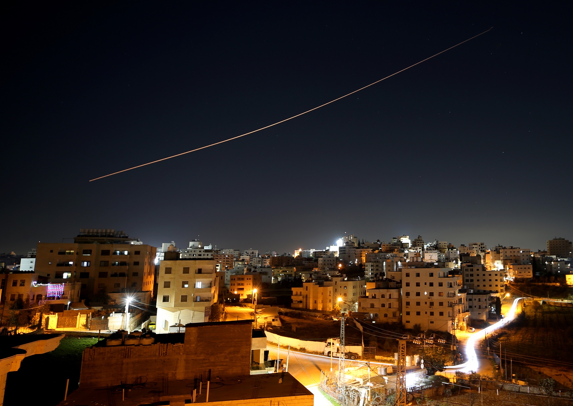 Missiles launched from Iran toward Israel&nbsp;across the night sky over Hebron in the West Bank&nbsp;on March 11.