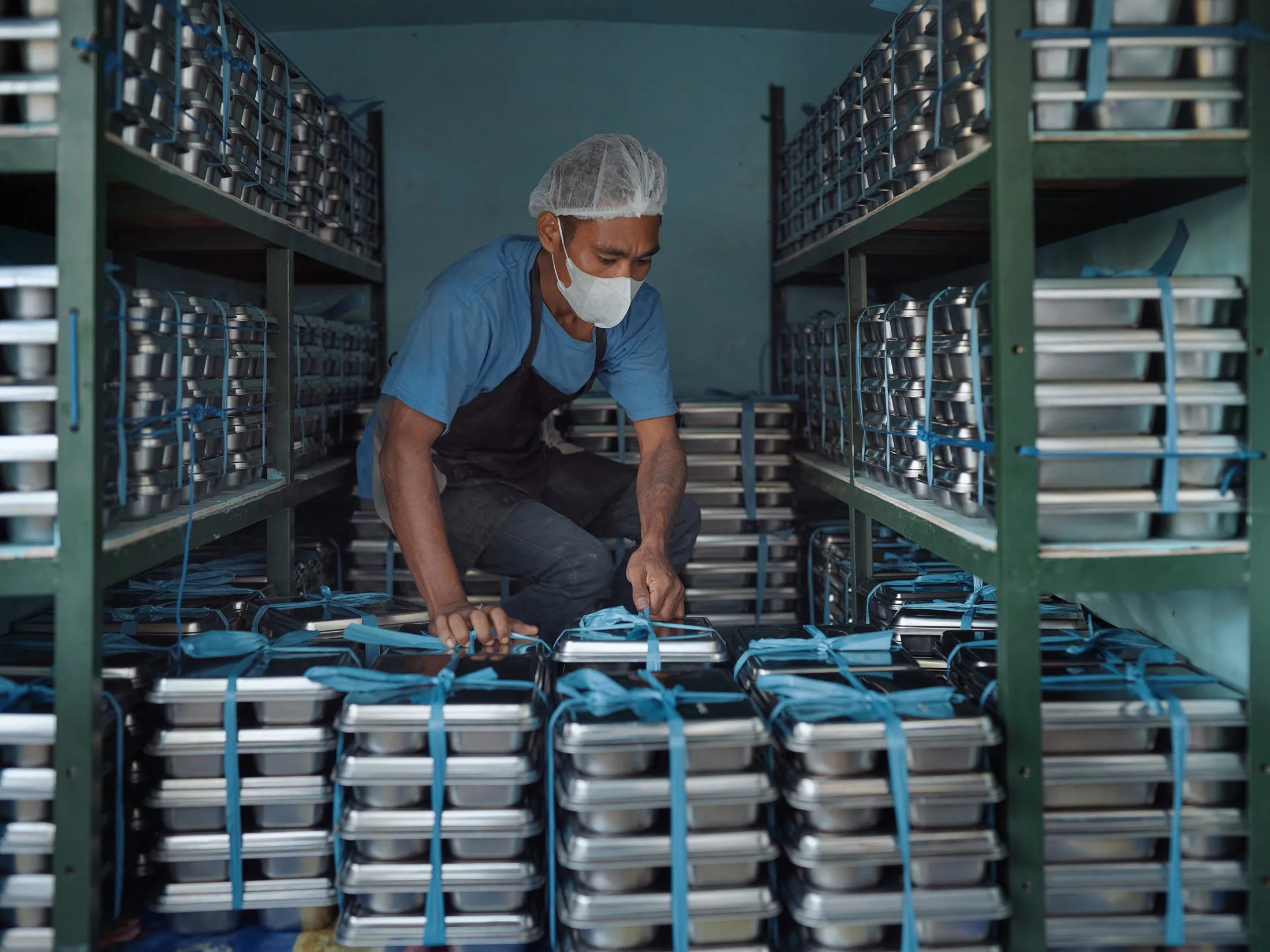 Containers of free meals are prepared for delivery&nbsp;in&nbsp;East Nusa Tenggara, Indonesia in March.&nbsp;