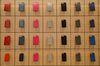 iPhone cases hang on display during a media preview of the new Apple Inc. Michigan Avenue store in Chicago, Illinois, U.S., on Thursday, Oct. 19, 2017. The building features exterior walls made entirely of glass with four interior columns supporting a 111-by-98 foot carbon-fiber roof, designed to minimize the boundary between the city and the Chicago River.