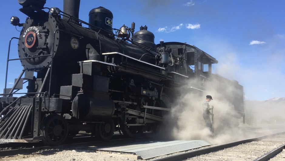 Locomotive breath: Con Trumbull walks through a gust of steam during Number 40's afternoon blow-out.