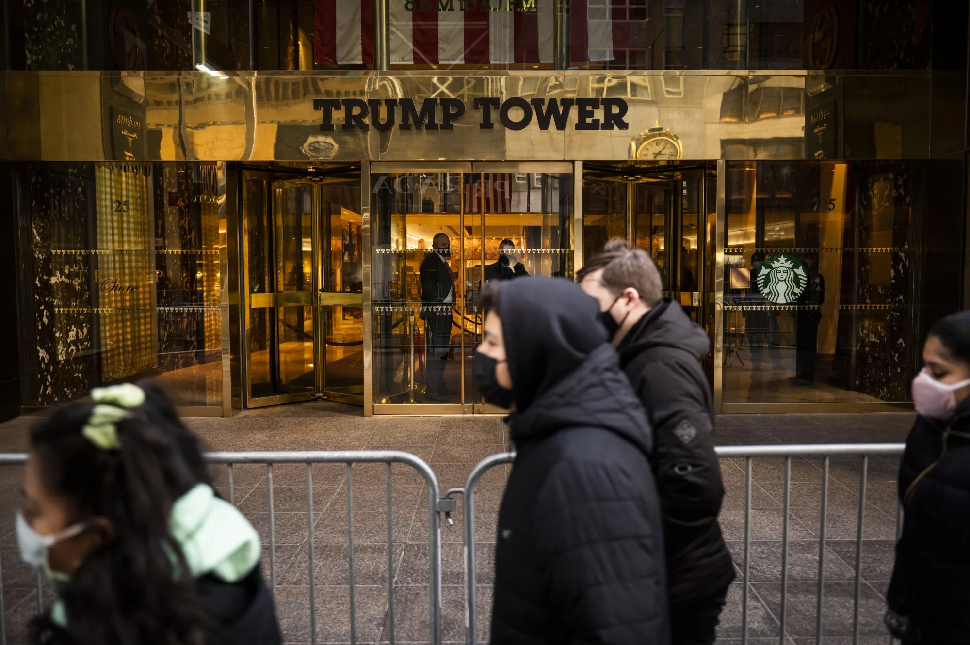 Pedestrians walk past Trump Tower in New York.