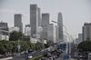 Vehicles travel along a section of the 3rd Ring Road in Beijing, China, on Monday, May 15, 2017. China's economy is staging a comeback as quickening inflation boosts factory profits, while stricter capital controls and a stabilizing currency help stem outflows.