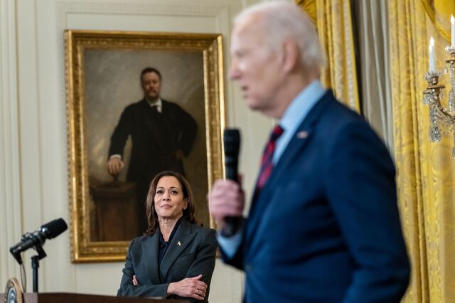 Kamala Harris looking on as Joe Biden speaks at a reception for new members of Congress in 2023