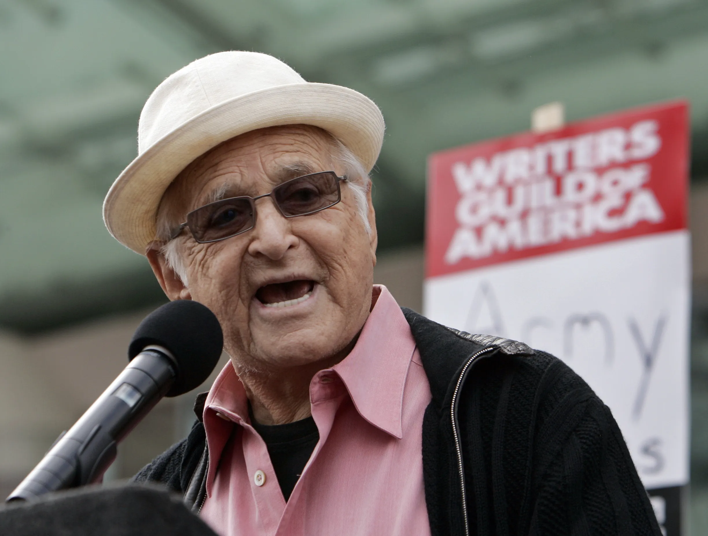 Producer Norman Lear speaks in support of thousands of Writers Guild of America (WGA) writers and others in the fifth day of their strike against the Alliance of Motion Picture and Television Producers (AMPTP) in a rally at Fox Plaza in Los Angeles' Century City district on Nov. 9, 2007. Lear, producer of TV's 'All in the Family' and influential liberal advocate, died Tuesday, Dec. 5, 2023, at 101. (AP Photo/Reed Saxon, File)