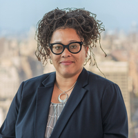 Stylized headshot in Bloomberg office of Erika Smith