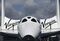 The Virgin Galactic SpaceShipTwo stands outside the company's stand on the third day of the Farnborough International Air Show in Farnborough, U.K., on July 11, 2012. Photographer: Chris Ratcliffe/Bloomberg