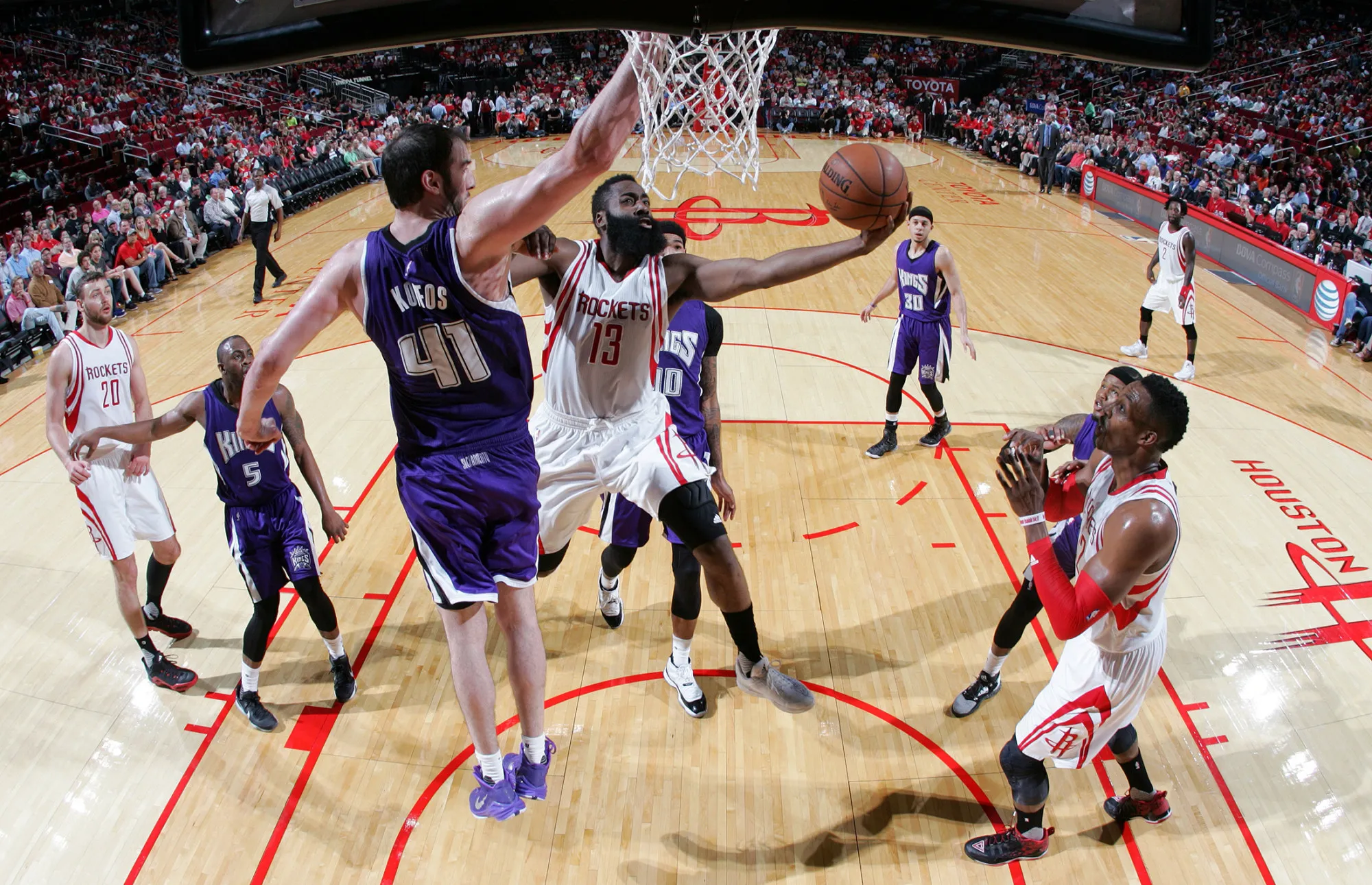 James Harden #13 of the Houston Rockets shoots the ball against the Sacramento Kings in Houston, Texas, on April 13, 2016.
