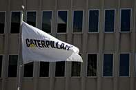 Caterpillar Office Raid Fuels Biggest Slump In Eight Months