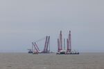 A pair of crane vessels preparing for a lift at Hinkley Point C nuclear power station site in Bridgwater, UK, on July 20. 