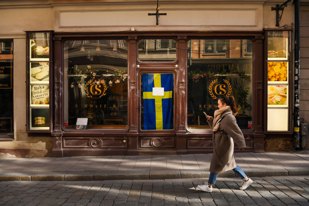 Sign in window, Stockholm, March 2020: “Closed until herd immunity is reached.”