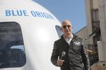 Jeff Bezos with the Blue Origin New Shepard system.