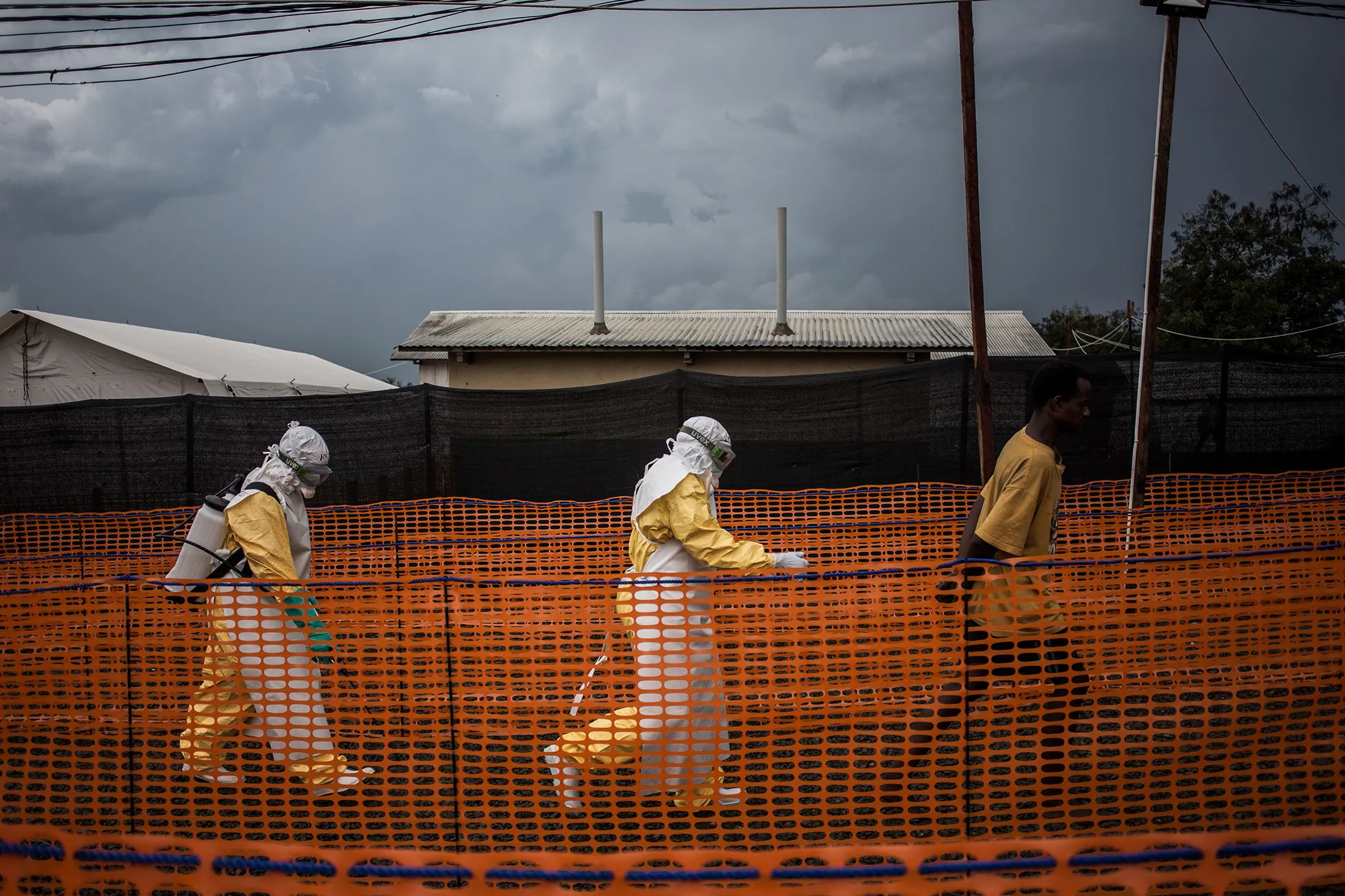 Health workers escort a&nbsp;patient at a&nbsp;treatment center in Bunia, Democratic Republic of the Congo,&nbsp;on Nov. 7, 2018